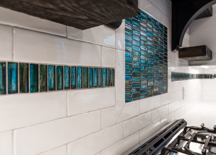 Backsplash of Lakehouse Kitchen by PH Design, custom construction home builders in Canton, OH