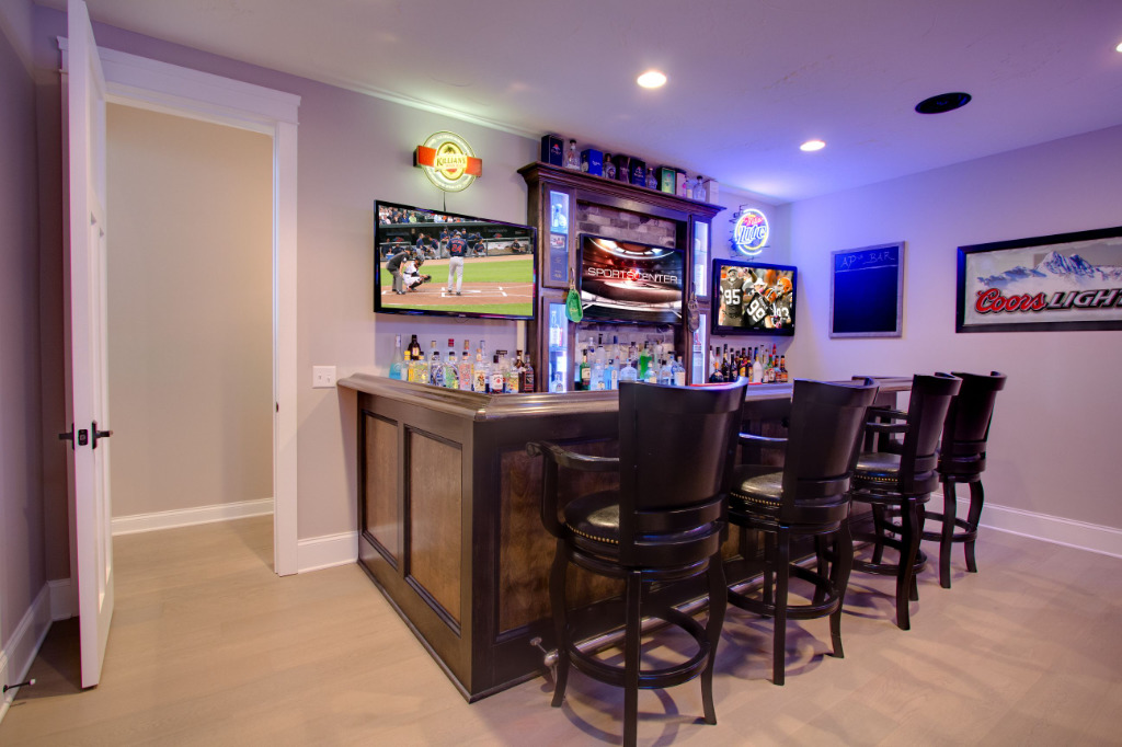Bar room of Basement Remodel by PH Design, home remodeling builders in Canton, OH