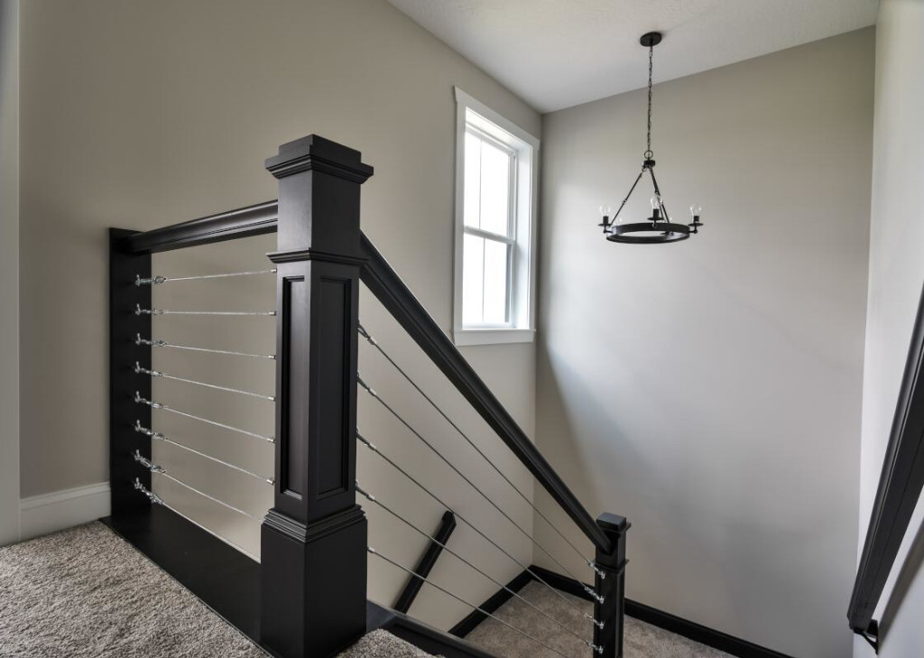 Stairway of Ardbeg Traditional Farmhouse Home by PH Design, custom construction home builders in Canton, OH