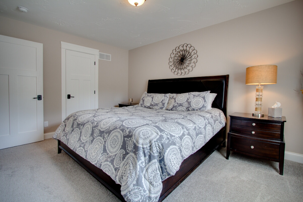 Bedroom of The Dalmore, colonial style home by PH Design, custom construction home builders in Canton, OH