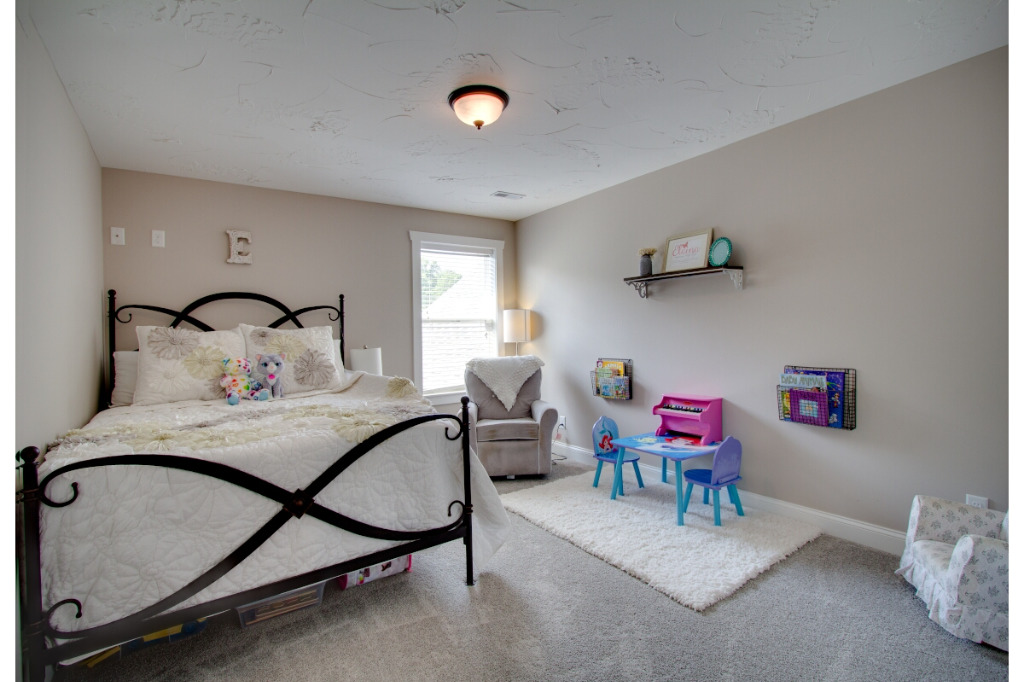 Children's bedroom of The Dalmore, colonial style home by PH Design, custom construction home builders in Canton, OH