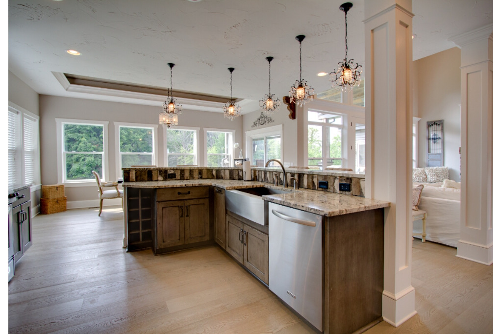 Kitchen counters of The Dalmore, colonial style home by PH Design, custom construction home builders in Canton, OH