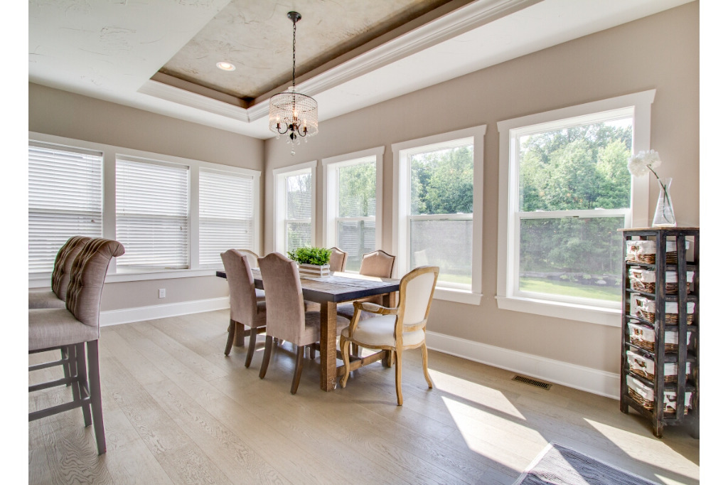 Dining area of The Dalmore, colonial style home by PH Design, custom construction home builders in Canton, OH