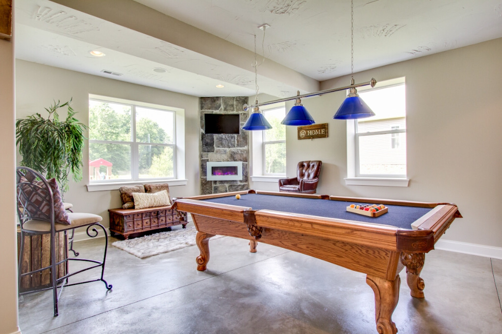 Recreation room of The Dalmore, colonial style home by PH Design, custom construction home builders in Canton, OH