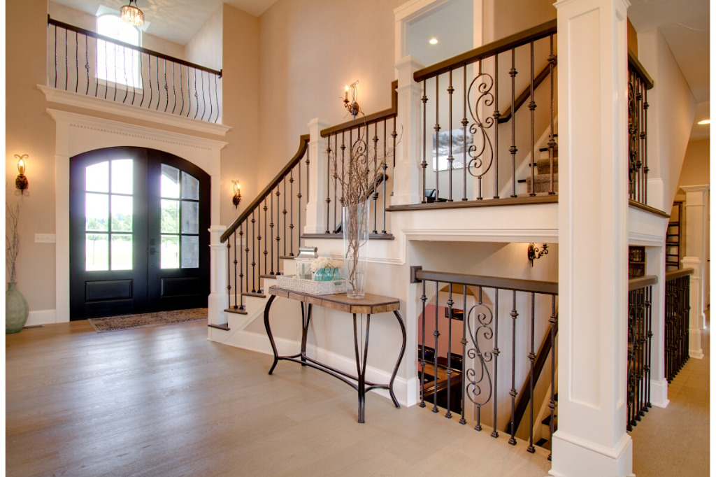 Main entryway of The Dalmore, colonial style home by PH Design, custom construction home builders in Canton, OH
