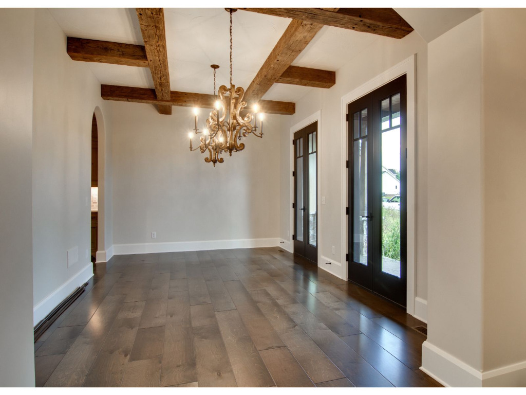 Unfurnished dining room of Woodford, tudor style home by PH Design, custom construction home builders in Canton, OH