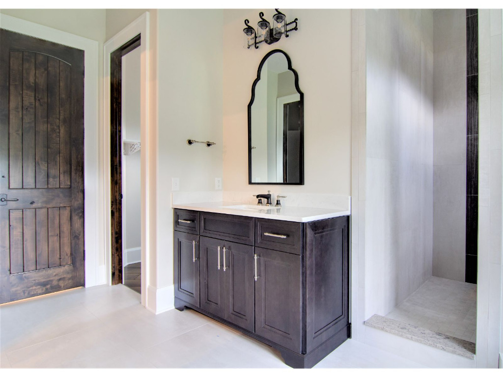 Bathroom of Woodford, tudor style home by PH Design, custom construction home builders in Canton, OH