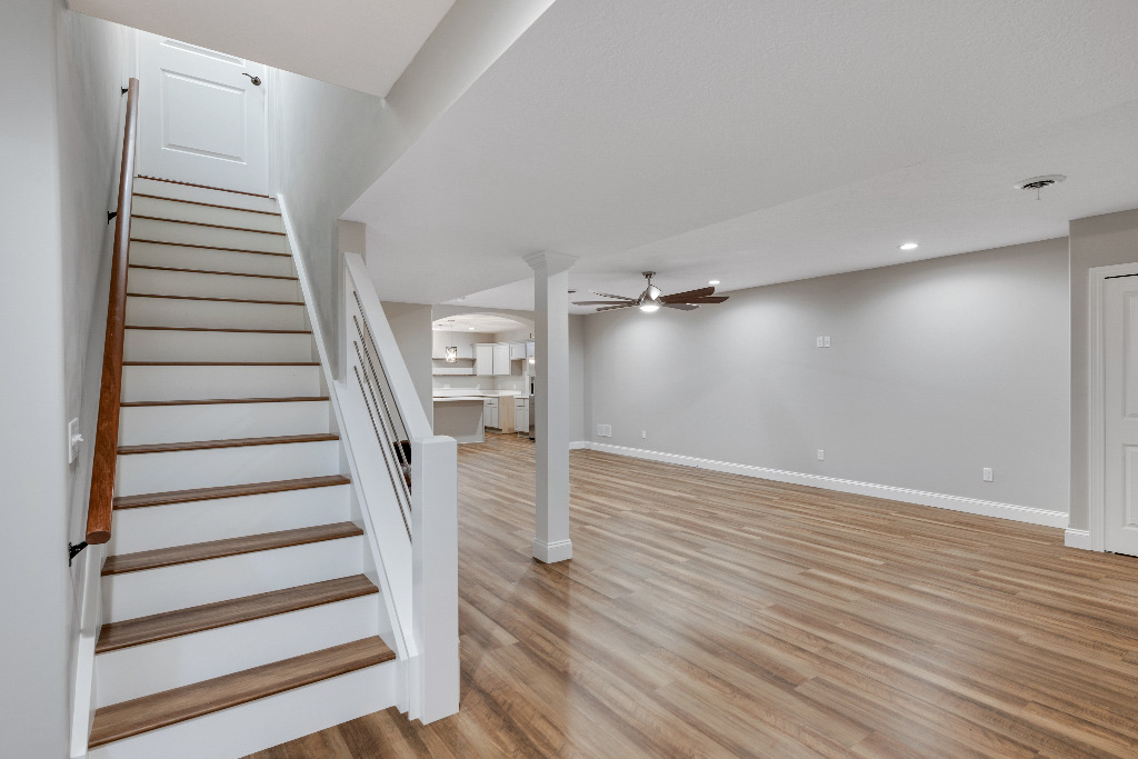 Stairway of Contemporary Basement Remodel by PH Design, home remodeling builders in Canton, OH