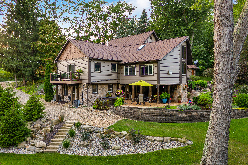 Rustic Exteriors renovation backyard view by PH Design, custom construction and renovation company in Canton, OH