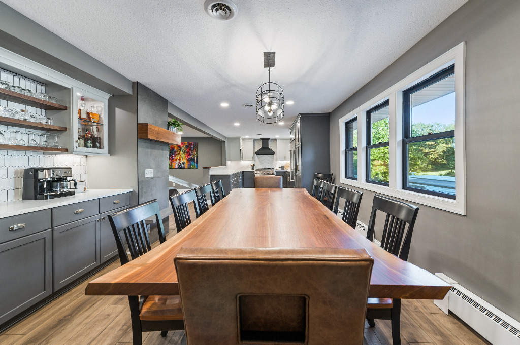 Furnished modern dining area of Whole House Remodel by PH Design, custom construction and renovation company in Canton, OH