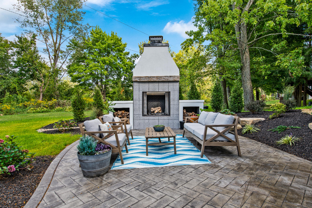Outdoor Living Remodel with fireplace by PH Design, home remodeling builders in Canton, OH